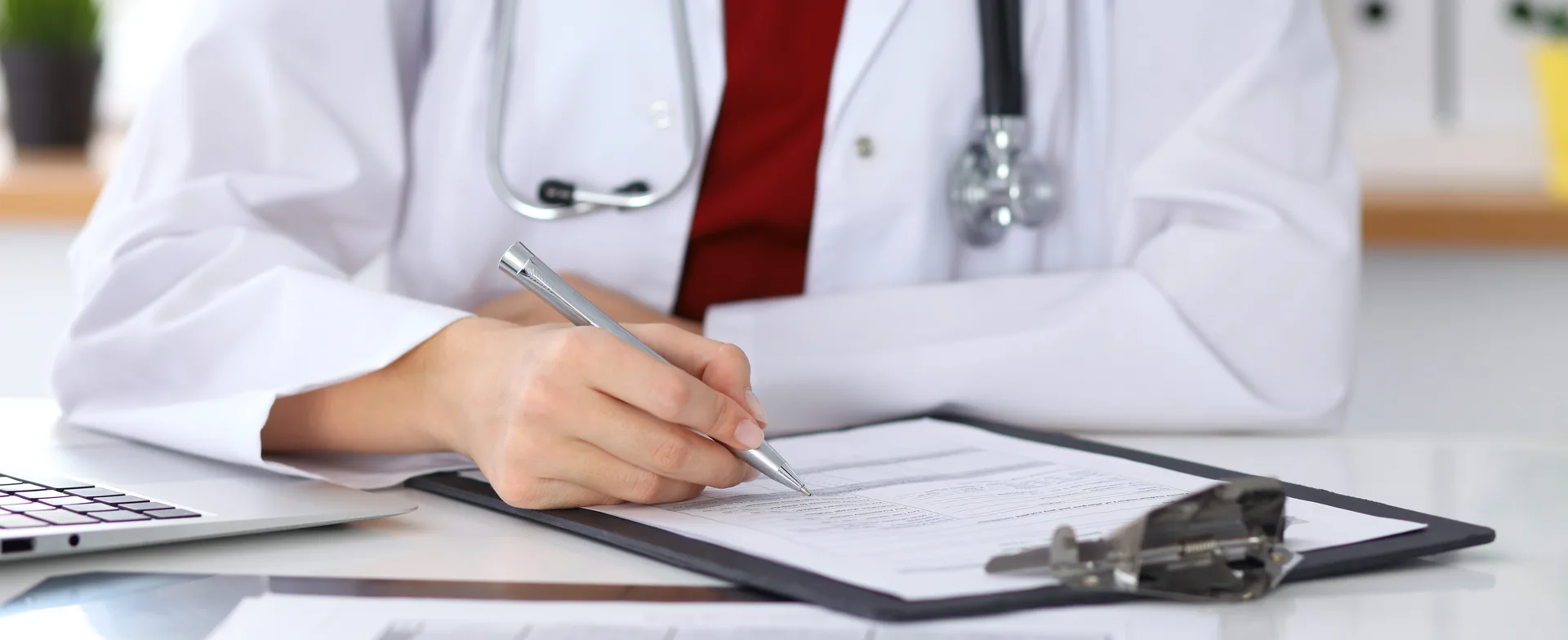 Doctor writing notes